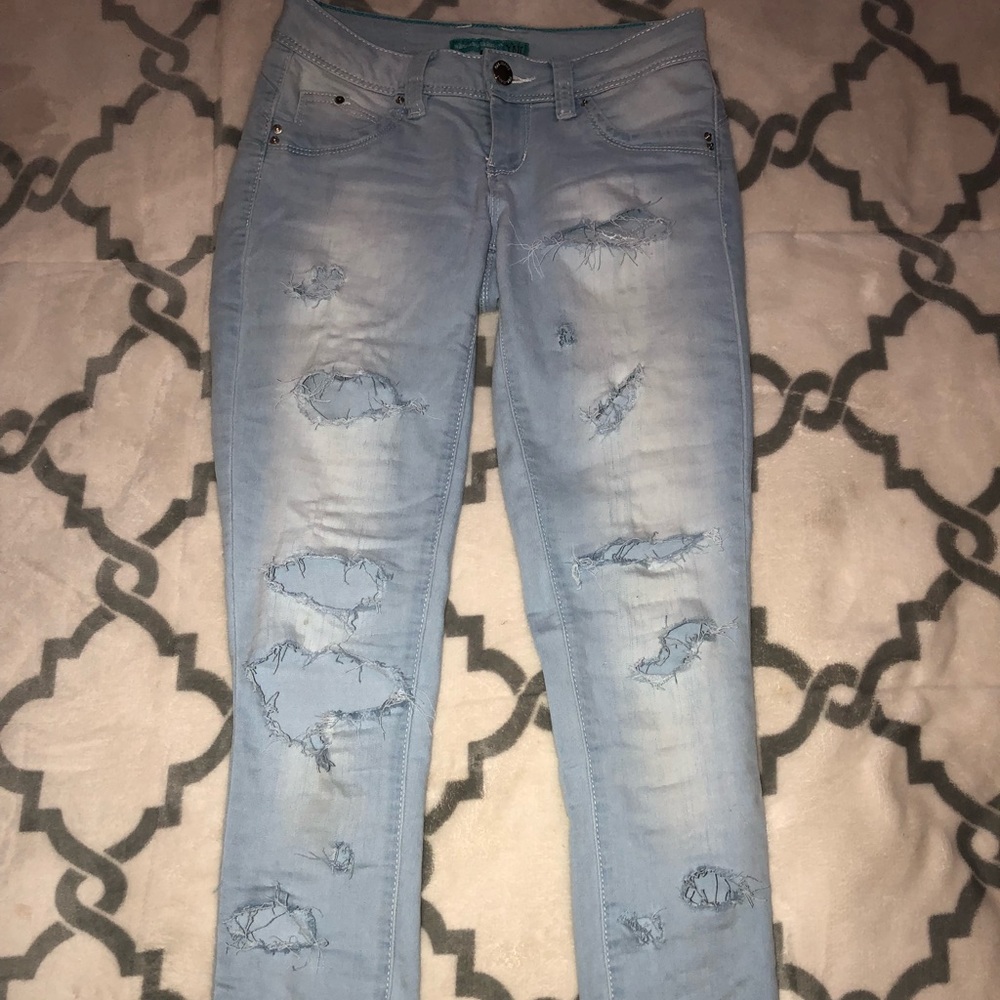 Denim light blue distressed jeans